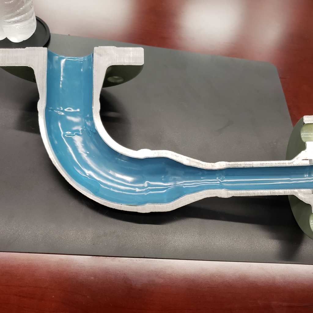 A pipe has been cut into a cross section to show the completed internal pipe coating applied by Coatech Baton Rouge. 