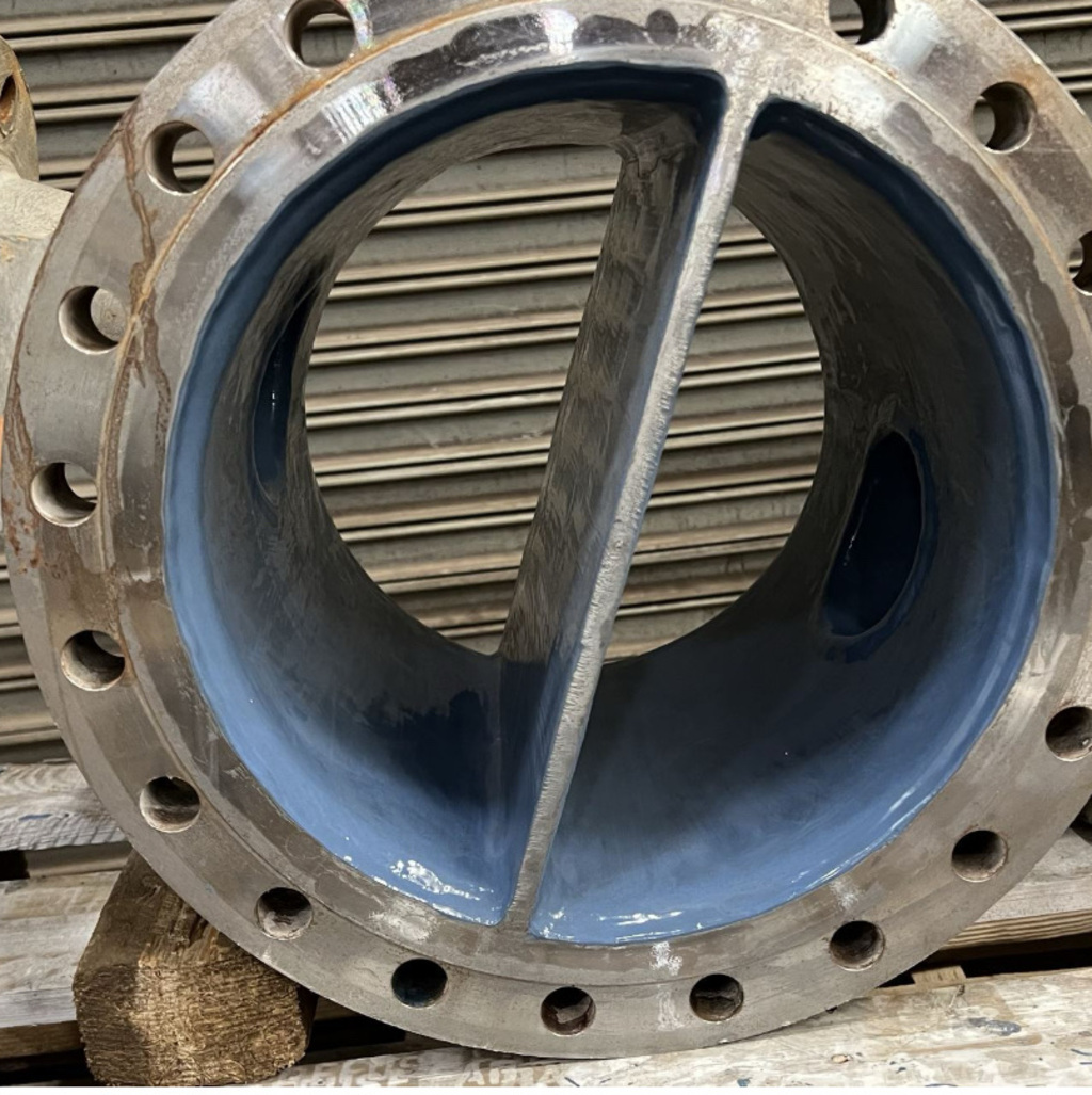 A pump part after completing blasting, rebuilding, and then coating of the internal portions. Coatech Baton Rouge specializes in pump repair and pump coating. 